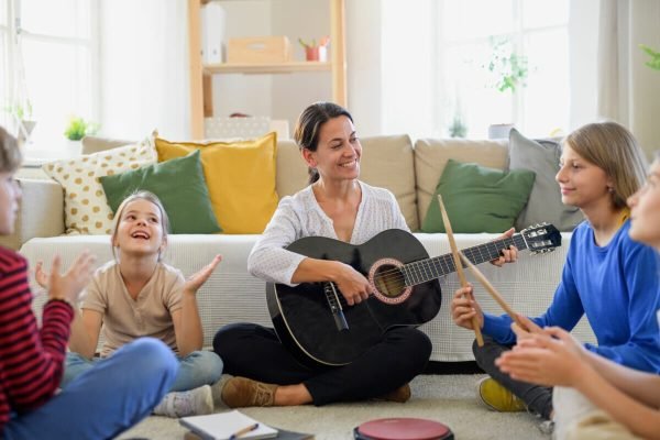 group-of-homeschooling-children-with-teacher-havin-2021-08-31-14-38-39-utc.jpg